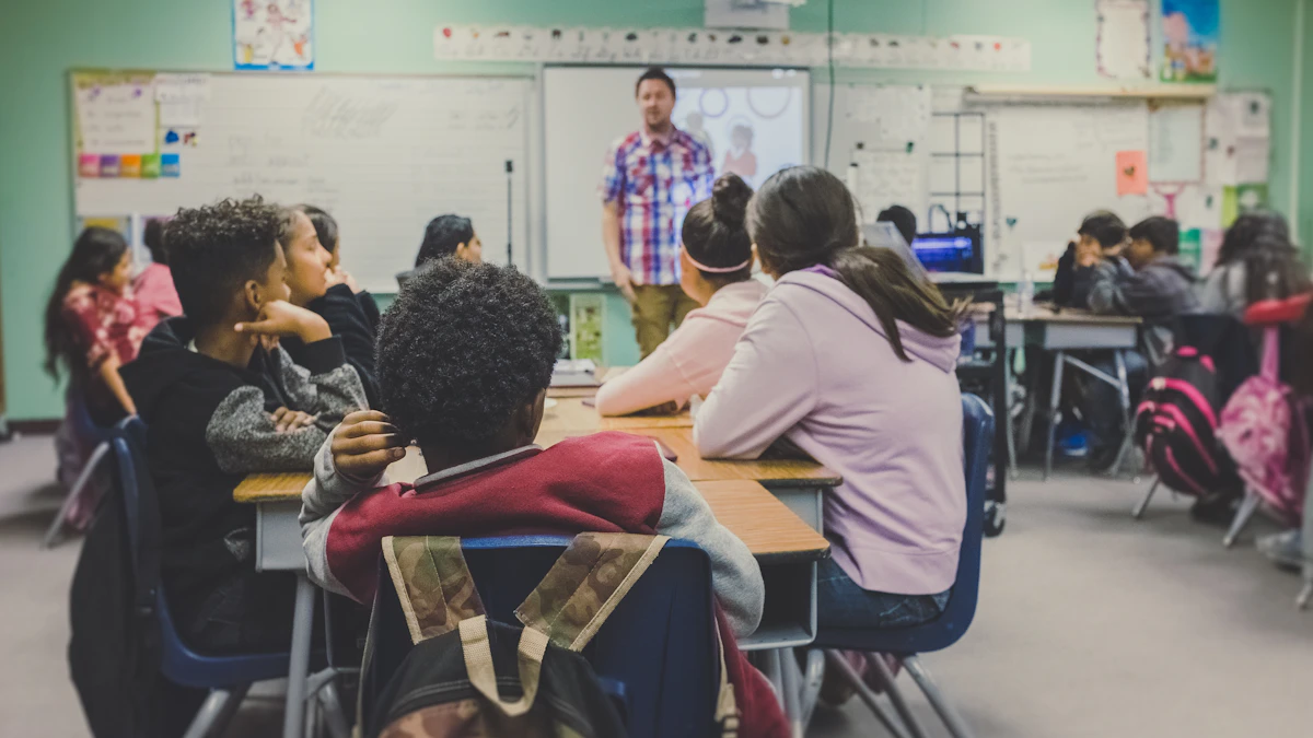 Teacher presenting on a large classroom display