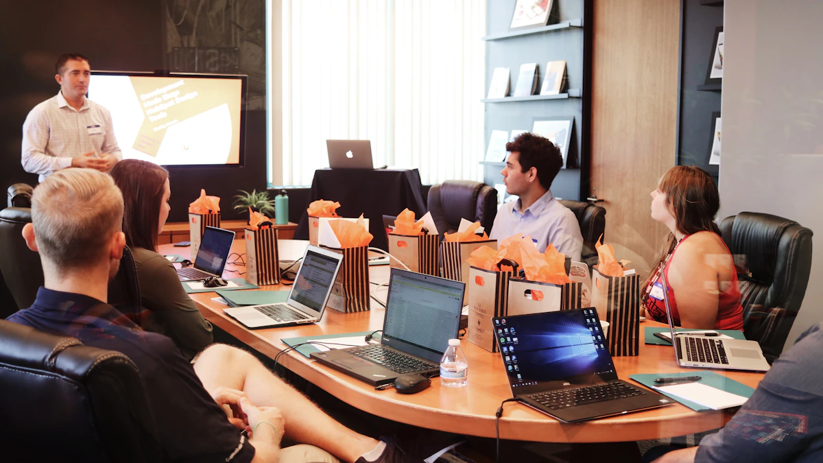 Professionals reviewing paperwork around a meeting table
